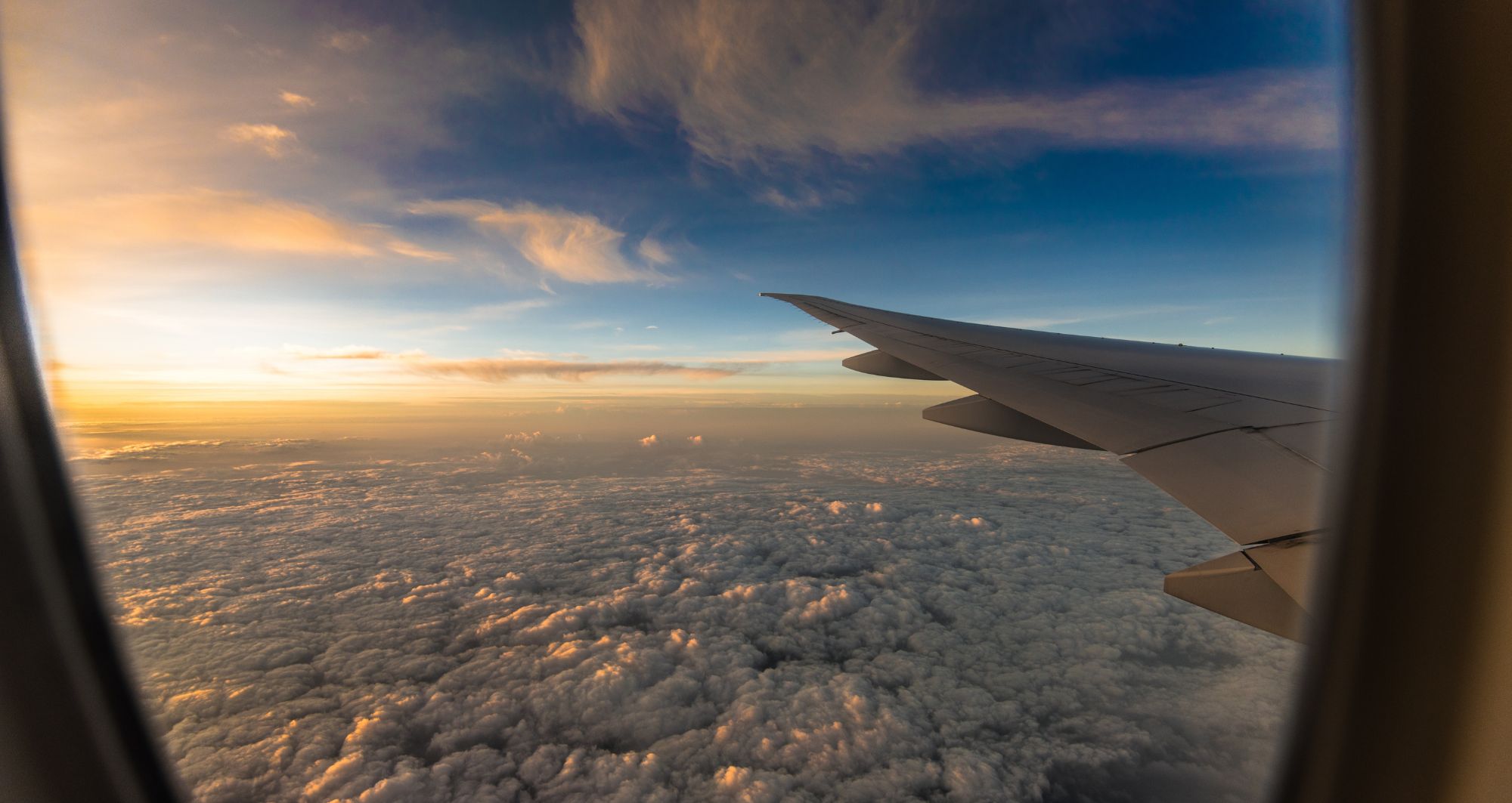 private jet charter NZ flying over the country seeing the sunrise