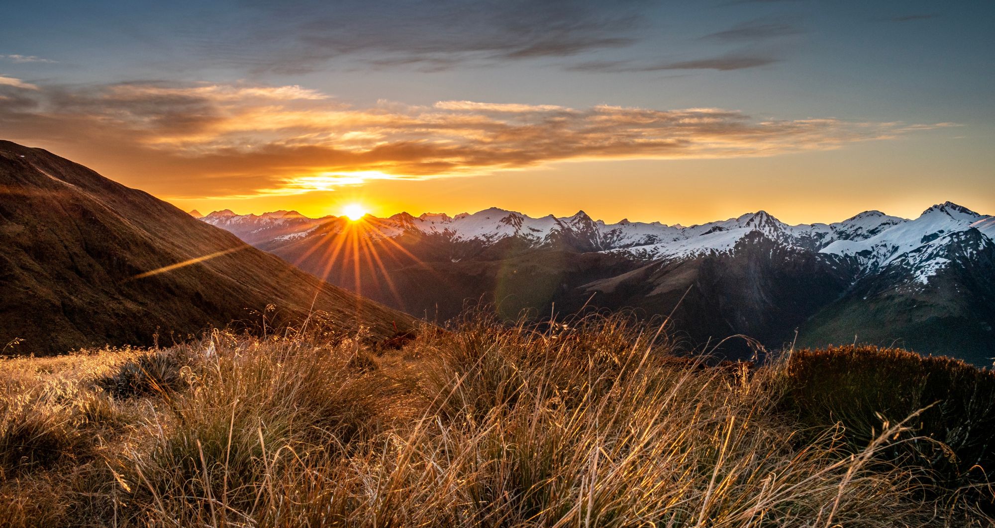 sunrise over majestic queenstown after a private jet charter to Queenstown