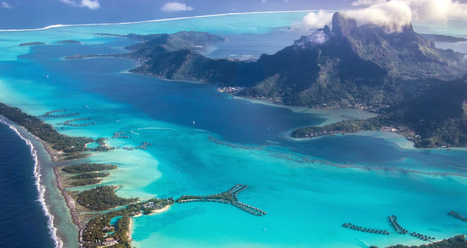 on a private jet charter to bora bora you'll see this stunning aerial view of the island